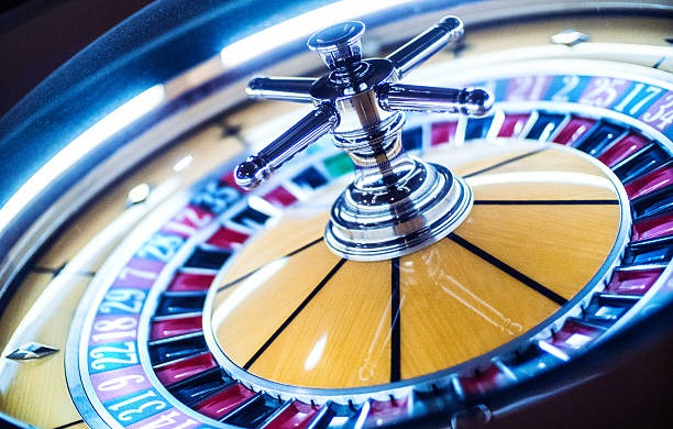 Live poker table with multiple players and dealer camera